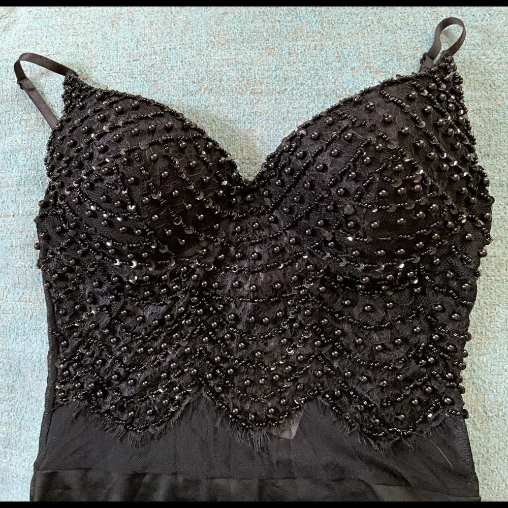 Black beaded Windsor bodysuit with built in bra. NWT